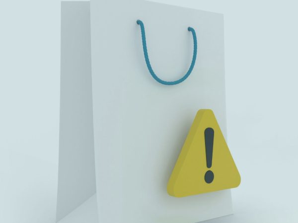 sacola de compras com o ícone de alerta